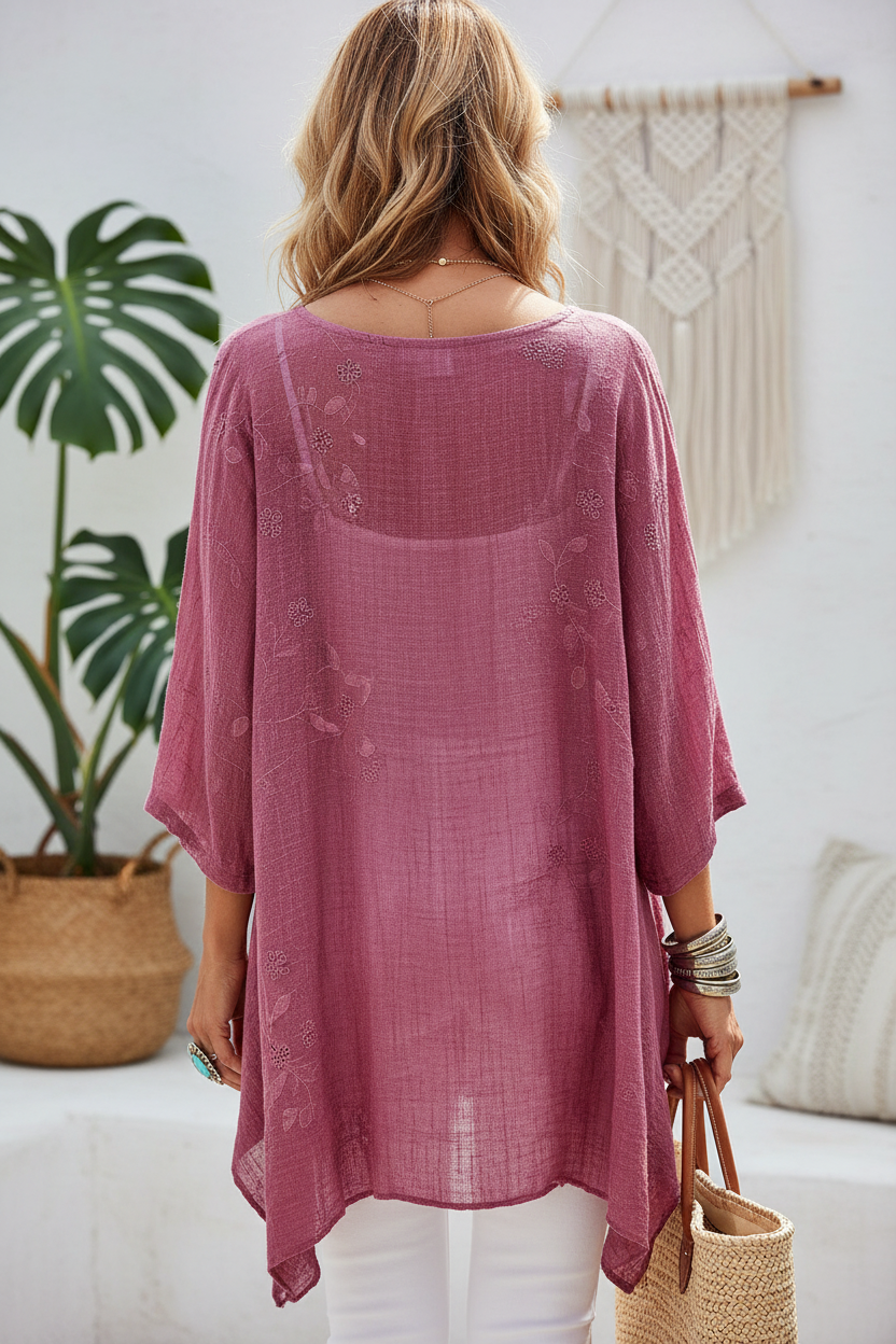 Editorial back view of see-through mauve tunic
