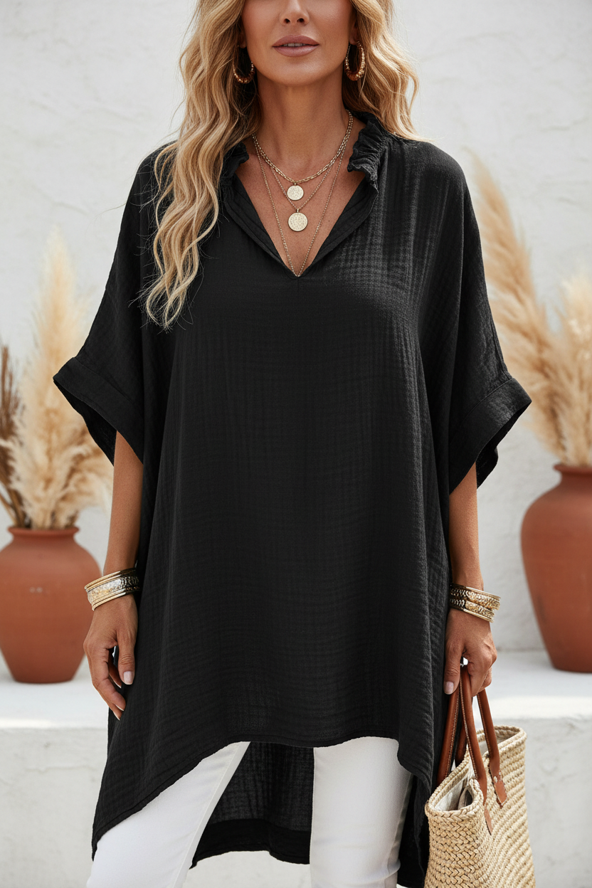 Editorial front view upper body shot of black tunic