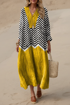 Editorial front view yellow chevron dress with beige background