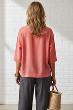 S138 coral pink blouse - back view with pants